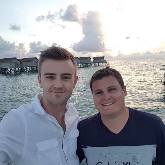 young men at the beach